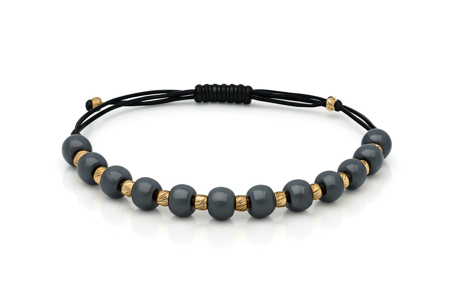 Black thread bracelet with onyx and gold