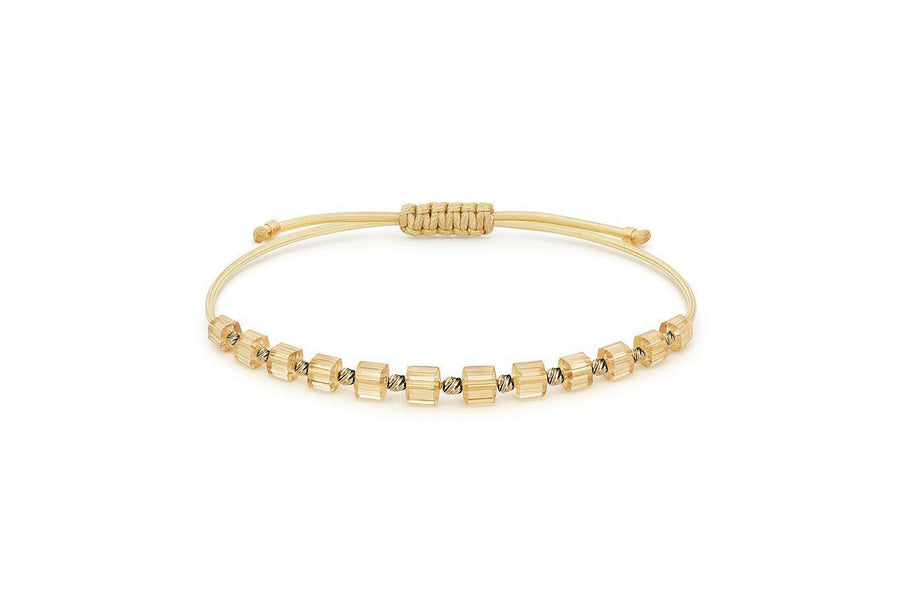 Cream thread bracelet with onyx and gold