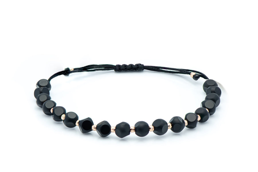 Black thread bracelet with onyx and gold