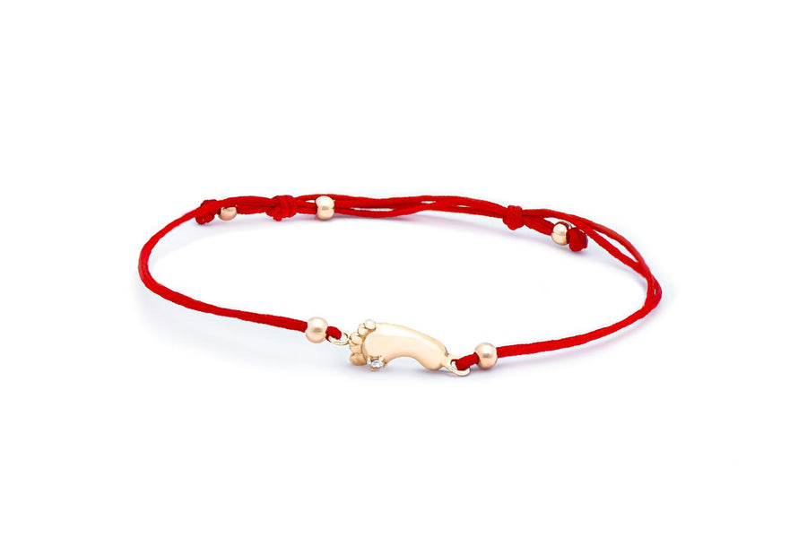 Raudono siūlo apyrankė su auksiniu cirkonio pakabuku