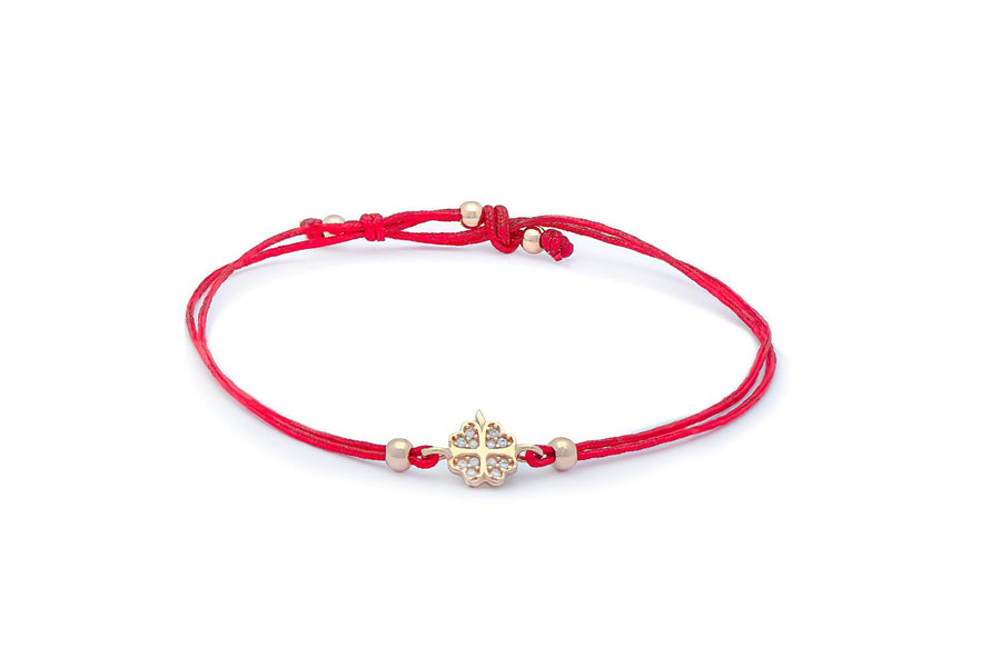 Raudono siūlo apyrankė su auksiniu cirkonio pakabuku