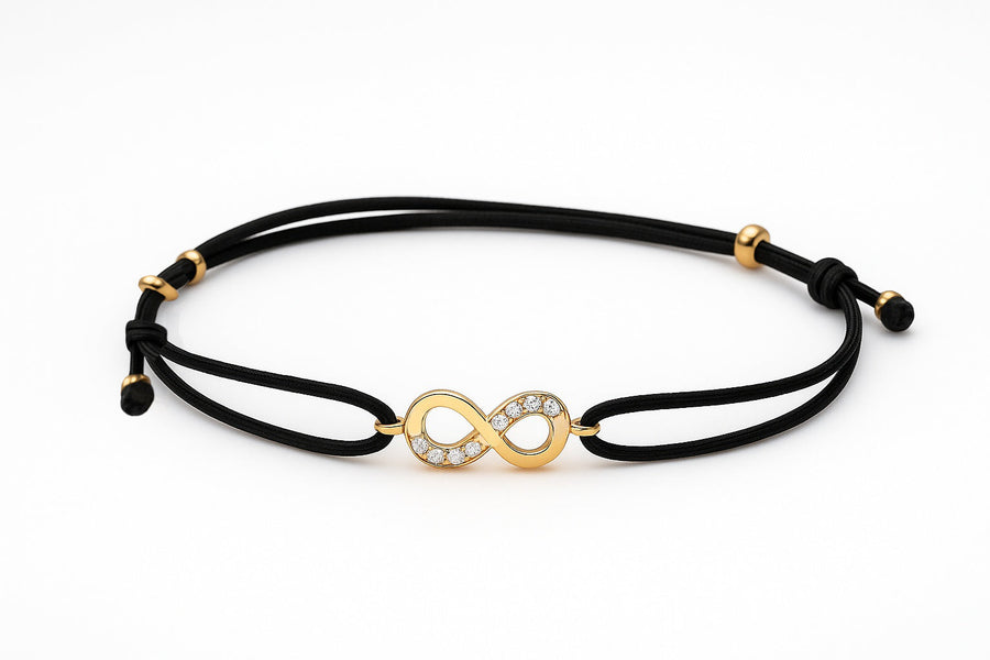 Juodo siūlo apyrankė su auksiniu cirkonio pakabuku