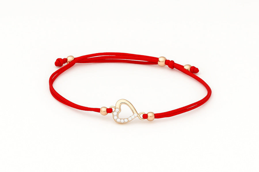 Raudono siūlo apyrankė su auksiniu cirkonio pakabuku