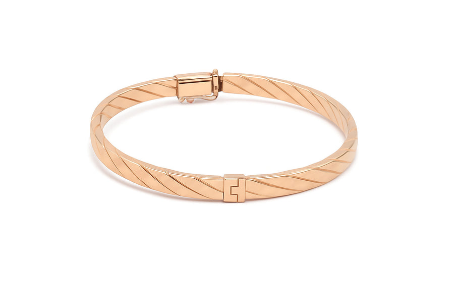 Auksinė kieta apyrankė