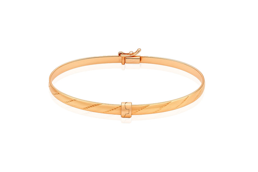 Auksinė kieta apyrankė