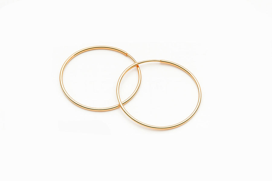 Klasikiniai auksiniai apvalūs auskarai