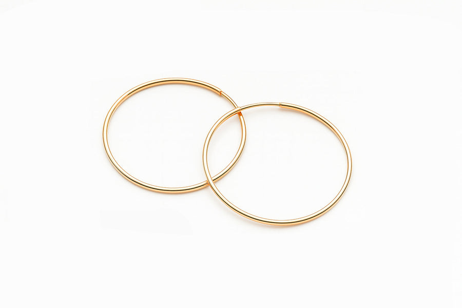 Klasikiniai auksiniai apvalūs auskarai