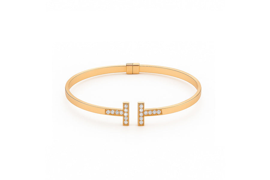 Auksinė kieta apyrankė su cirkoniais