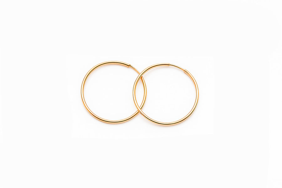 Klasikiniai auksiniai apvalūs auskarai