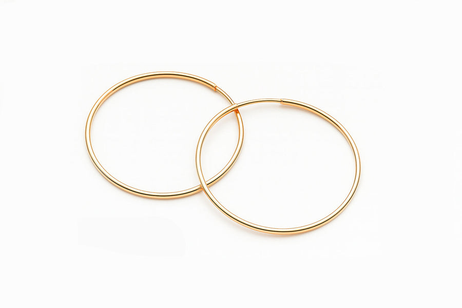 Klasikiniai auksiniai apvalūs auskarai