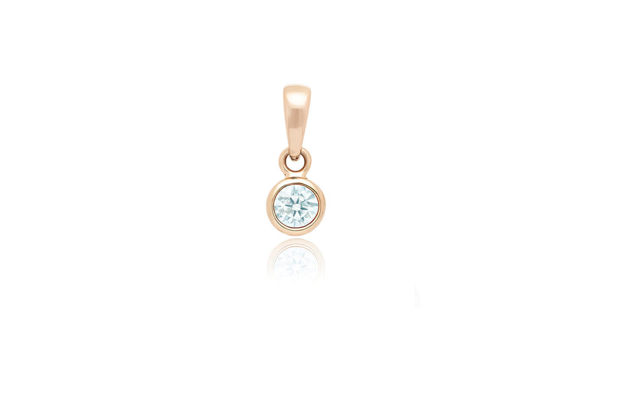 Gold pendant with zircon