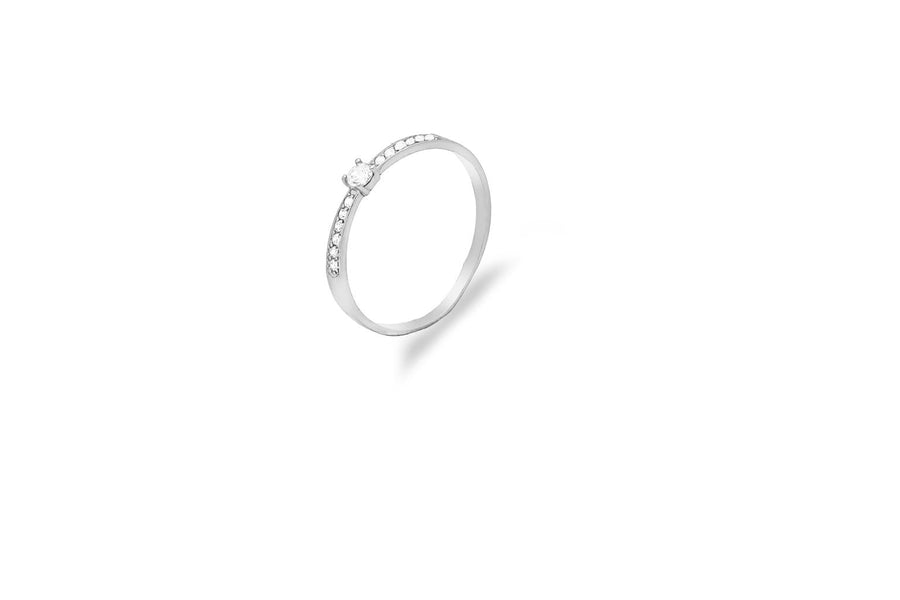 White gold ring with zircons