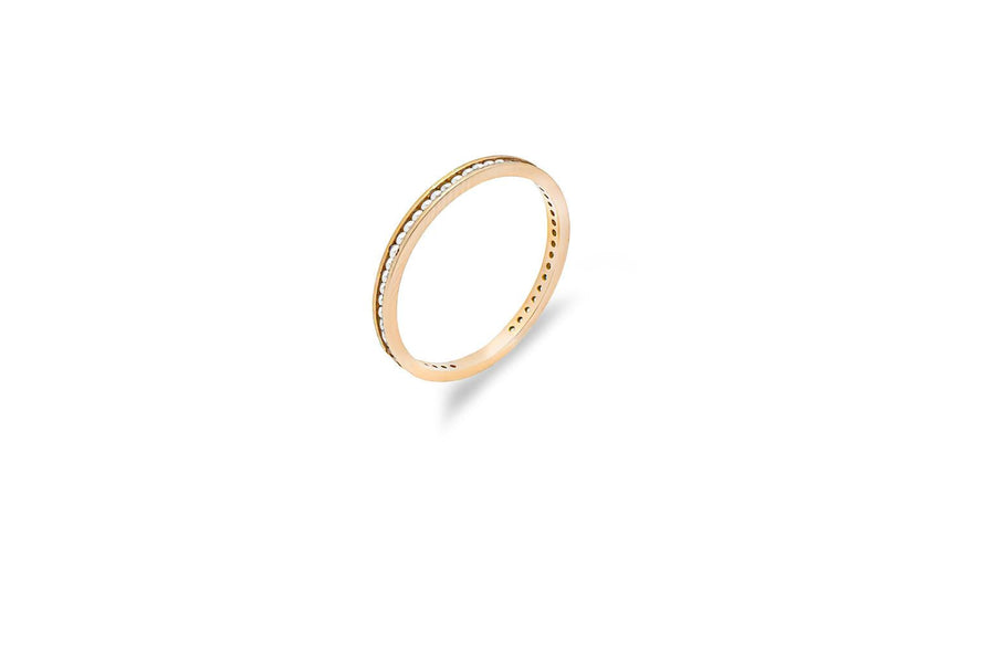 Gold ring with zircons